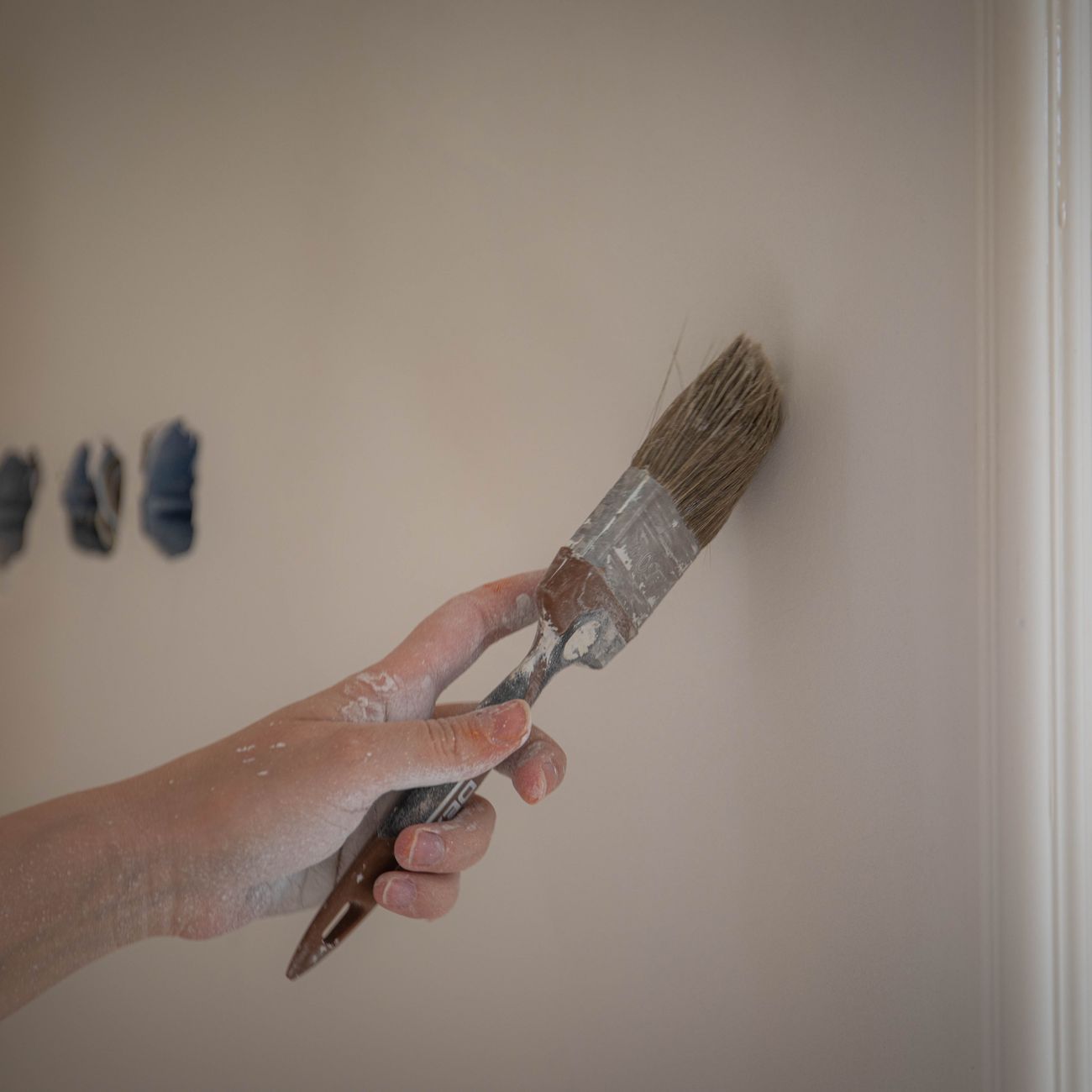 Cutting in by hand along an edge, which is the slow half of any room.